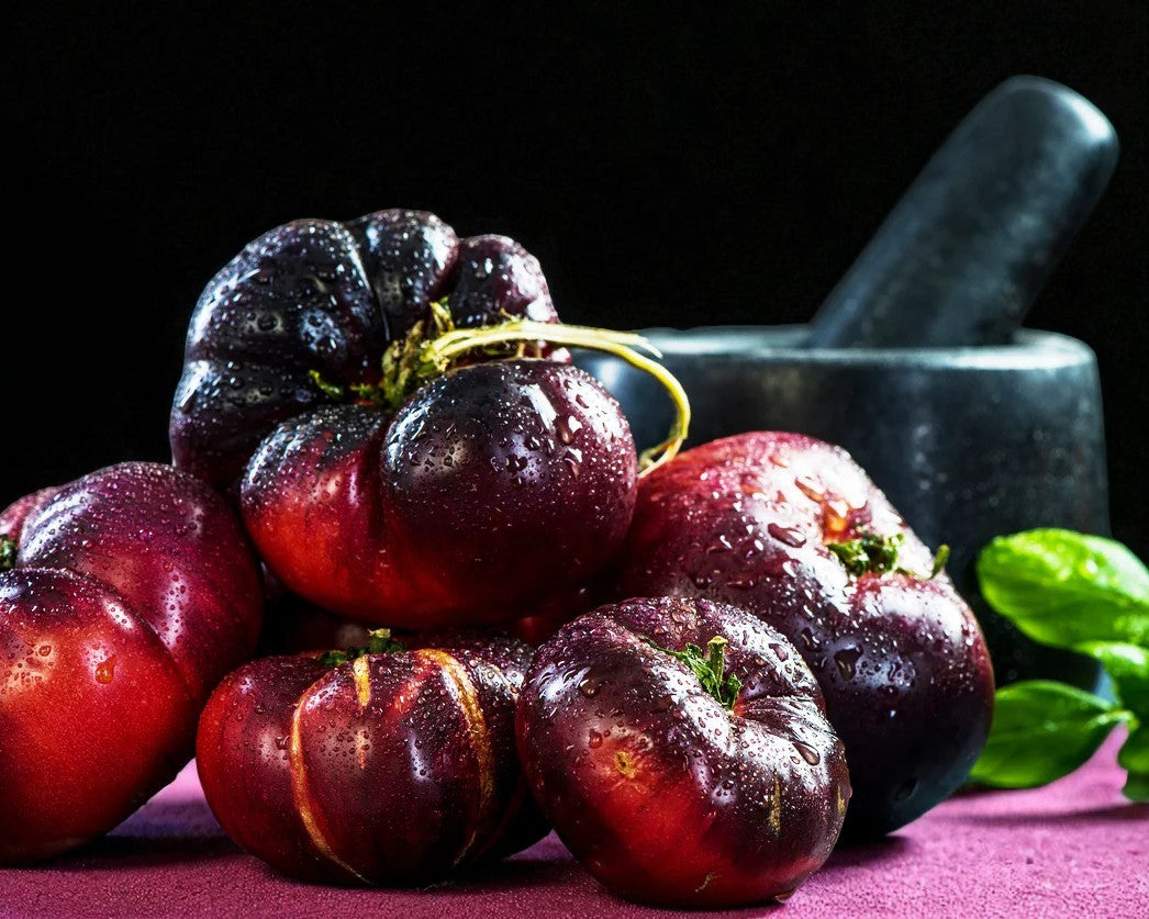 Close-up of Amethyst Jewel red fruits with a black background